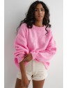 Sweter oversize z bufiastymi rękawami - różowy